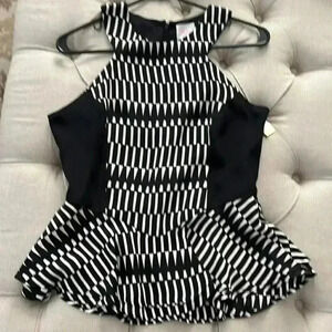 Parker medium zip up black and white peplum shirt